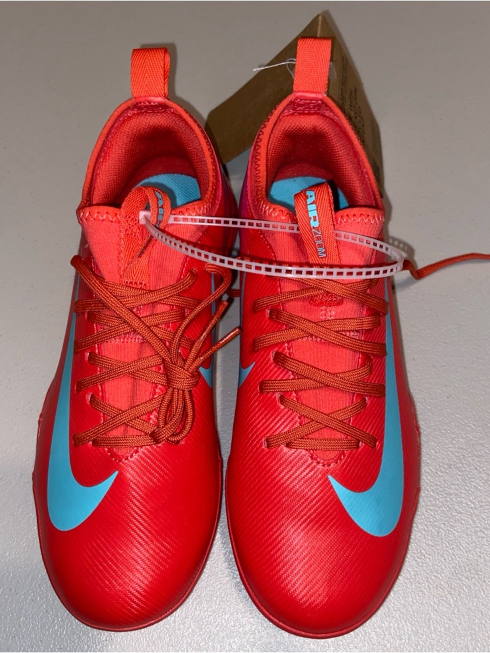 Nike Red Sneakers with Turquoise Swoosh